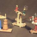 Volkskunstspielzeug - Butterfrau, Schaukelreiter und Storchenreiter - 1989 