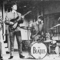 Englische Postkarte mit "The Beatles live in Concert" - 1964
